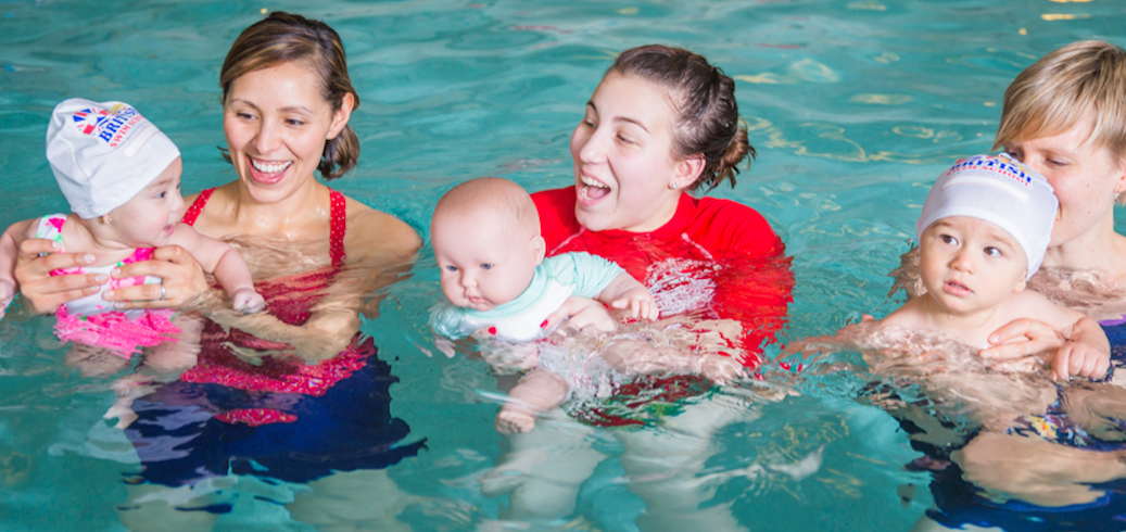 Parent participating in a mommy and me swim class